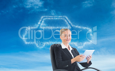 Composite image of businesswoman sitting on swivel chair with ta