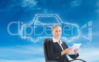 Composite image of businesswoman sitting on swivel chair with ta