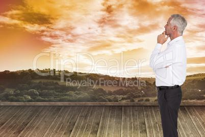 Composite image of thoughtful businessman posing