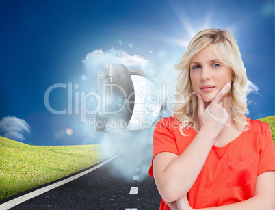 Composite image of teenager standing upright thoughtfully with h