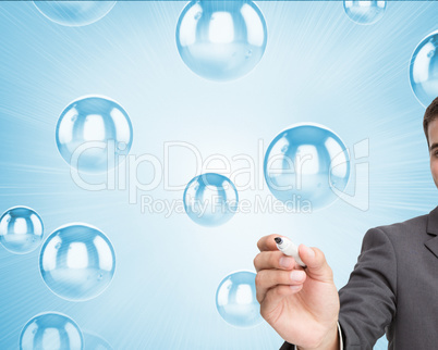 Composite image of young businessman writing something