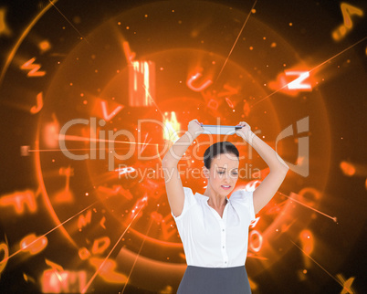 Composite image of angry businesswoman throwing her tablet pc