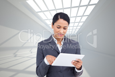 Composite image of close up of saleswoman with her touch screen