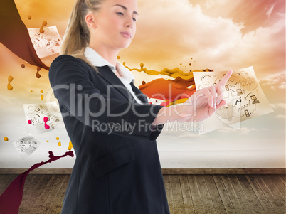 Composite image of businesswoman pointing somewhere