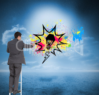 Composite image of businessman standing on ladder