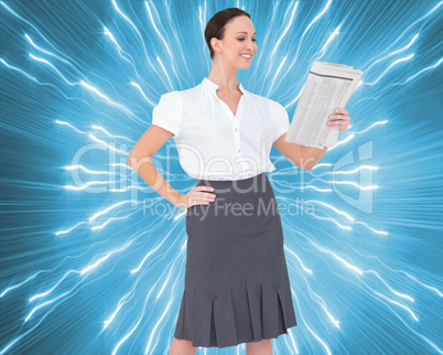 Composite image of cheerful stylish businesswoman holding newspa