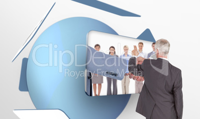 Composite image of rear view of classy mature businessman pointi