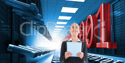 Composite image of businesswoman holding new tablet