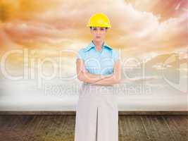 Composite image of serious pretty architect posing