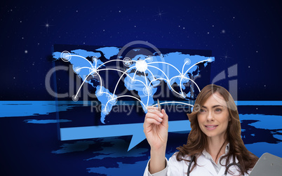 Composite image of smiling doctor pointing