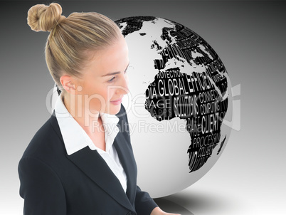 Composite image of businesswoman holding tablet