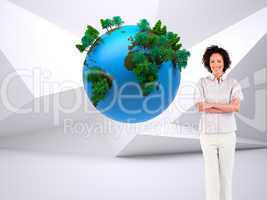 Composite image of businesswoman with crossed arms