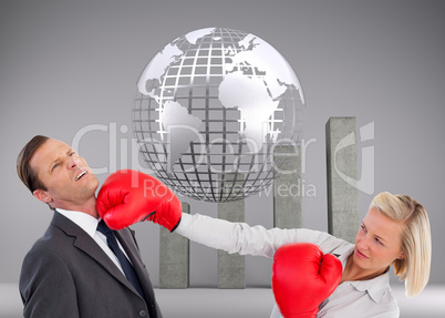 Composite image of businesswoman hitting colleague with her boxi