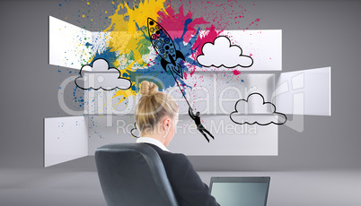 Composite image of businesswoman sitting on swivel chair with la Composite image of businesswoman sitting on swivel chair with la