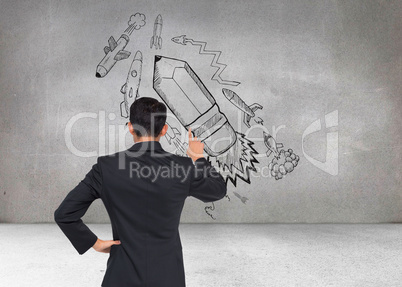 Composite image of asian businessman pointing