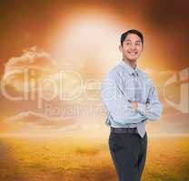 Composite image of smiling asian businessman