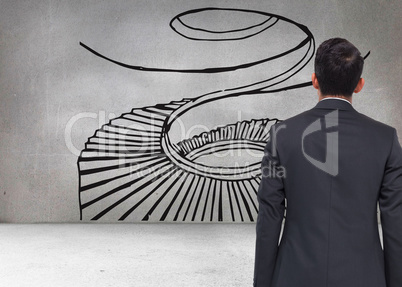 Composite image of grey wall with spiral stair