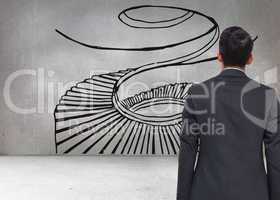 Composite image of grey wall with spiral stair