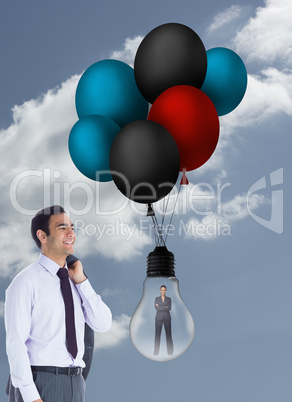 Composite image of smiling businessman standing