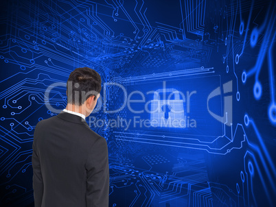 Composite image of businessman turning his back to camera