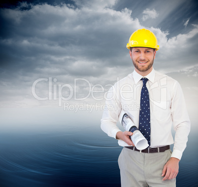 Composite image of cheerful young architect posing