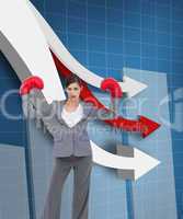 Composite image of businesswoman with boxing gloves