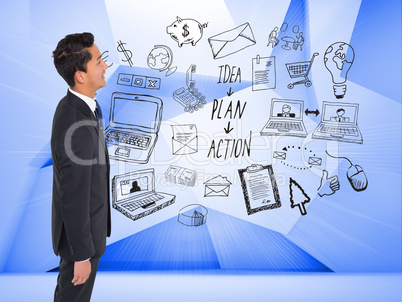 Composite image of happy businessman looking up