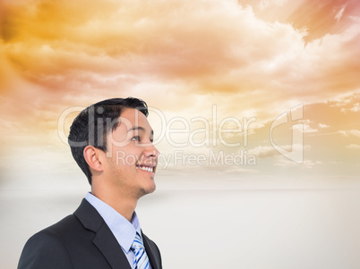 Composite image of smiling asian businessman