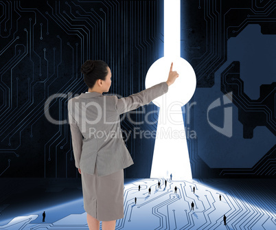 Composite image of asian businesswoman pointing