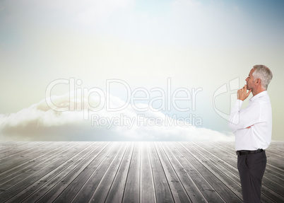 Composite image of thoughtful businessman posing