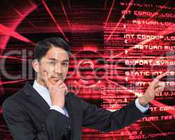 Composite image of thoughtful asian businessman pointing