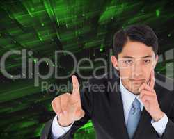 Composite image of thoughtful asian businessman pointing