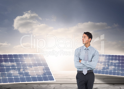 Composite image of serious asian businessman