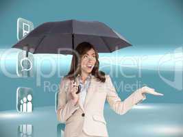 Composite image of elegant businesswoman holding black umbrella