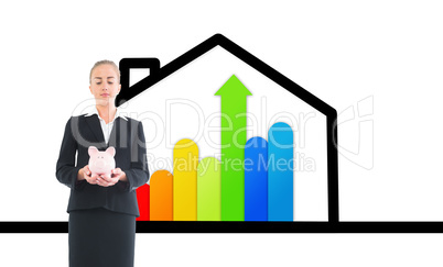 Composite image of businesswoman holding pink piggy bank