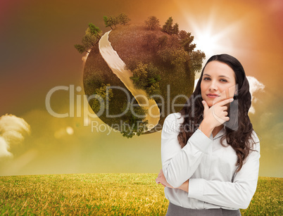 Composite image of portrait of a businesswoman posing