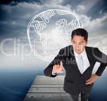 Composite image of unsmiling asian businessman pointing