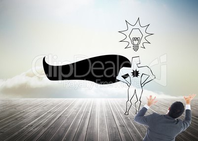 Composite image of businessman with arms raised