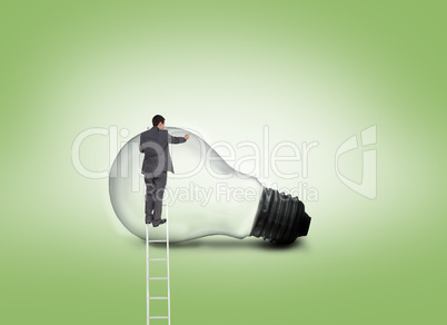 Composite image of businessman standing on ladder