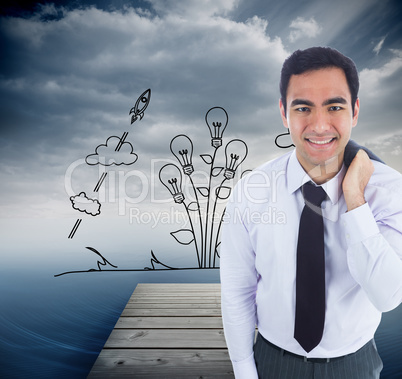 Composite image of smiling businessman standing