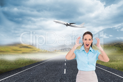 Composite image of surprised stylish businesswoman posing