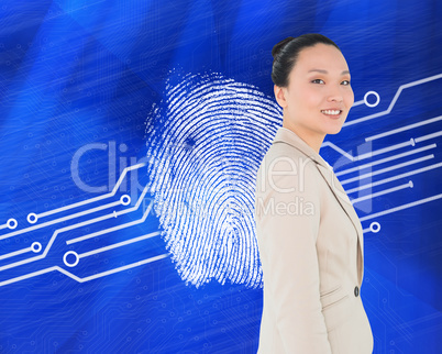 Composite image of smiling asian businesswoman