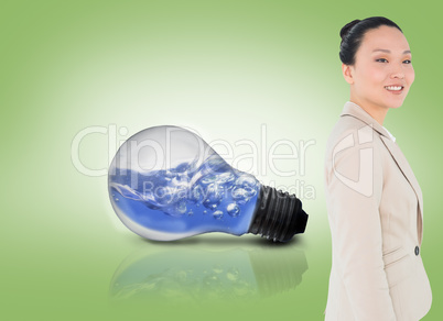 Composite image of smiling asian businesswoman