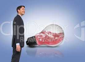 Composite image of smiling asian businessman