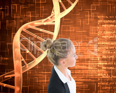 Composite image of businesswoman standing with hands on hips