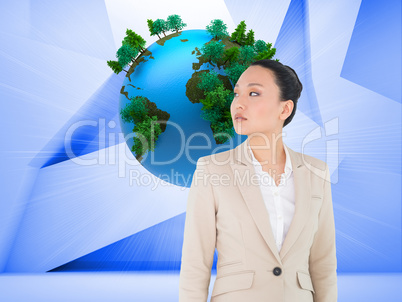 Composite image of unsmiling asian businesswoman