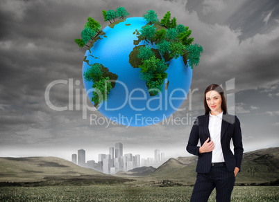 Composite image of portrait of a confident businesswoman standin