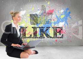 Composite image of businesswoman using laptop