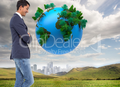 Composite image of smiling casual businessman with arms crossed