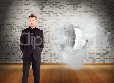 Composite image of young businessman looking at the camera